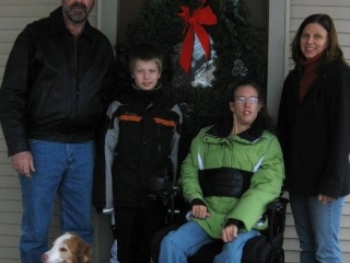 December 2009, the first (partial) family photo posted on Facebook.