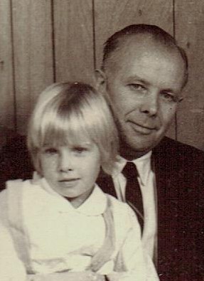 1969 Delbert Larson holding his daughter Doris