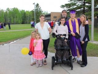 Grand daughters Johannah, Julianna, Daughter-Jen, Daughter-Kristi, husband-Andy(in back), Son (graduate)-Cory, Doris