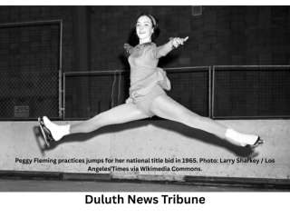 Peggy Fleming performing a mid-air split jump on an ice rink in 1965.